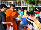 พิธีทำบุญตักบาตร เนื่องในวันขึ้นปีใหม่ ปีพุทธศักราช 2568 Image 98